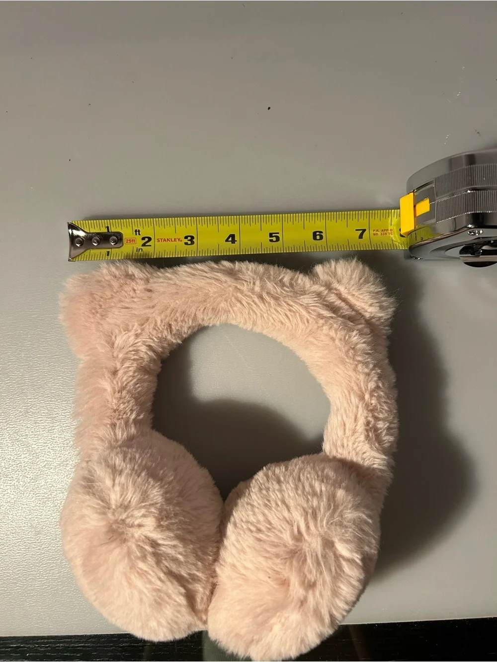 Kids pink fuzzy cat ear muffs